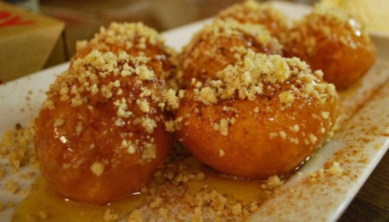 loukoumades-drizzled-with-nuts-and-honey
